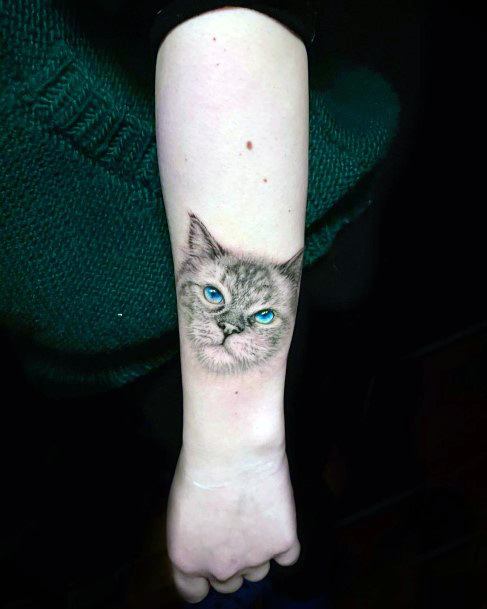 Womens Hand Blue Eye Cat Tattoo