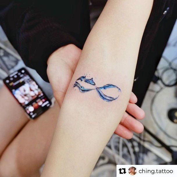 Womens Hands Blue Colored Infinity Tattoo
