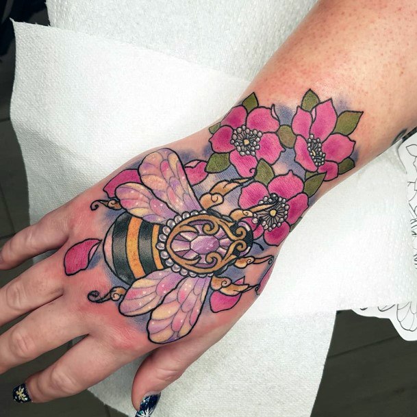 Womens Hands Colorful Flowers And Bees Tattoo