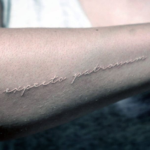 Womens Hands White Ink Cursive Tattoo