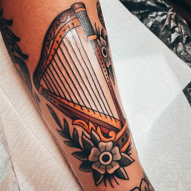 Womens Harp Super Tattoo Designs