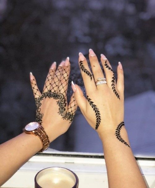 Womens Laced And Floral Henna Tattoo Fingers