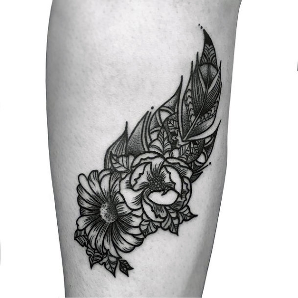 Womens Legs Black Flowers And Feather Tattoo