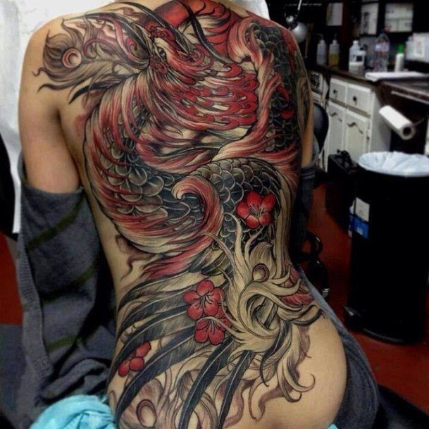 Womens Marvellous Red And Grey Tattoo On The Back