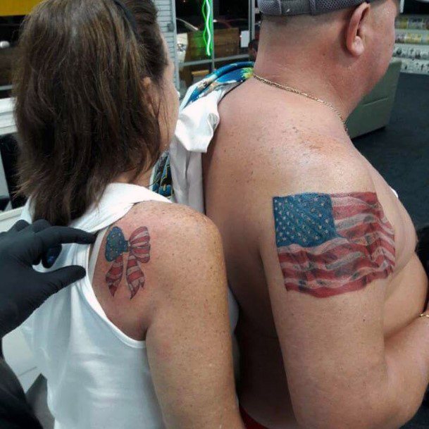 Womens Matching American Flag Tattoo On Arms