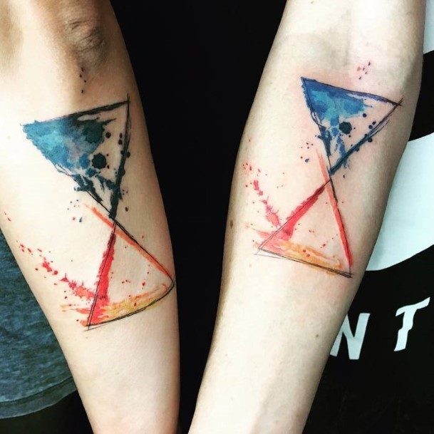 Womens Matching Blue Red Hourglass Tattoo Forearms