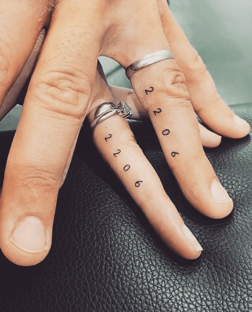 Womens Number Tattoo Fingers