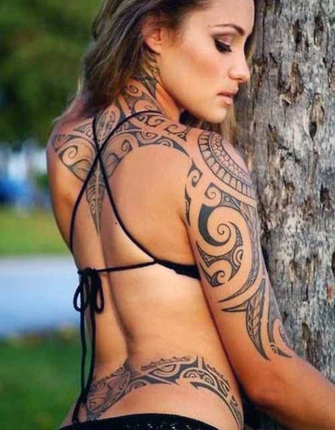 Womens Primitive Tribal Tattoo On Arms And Back