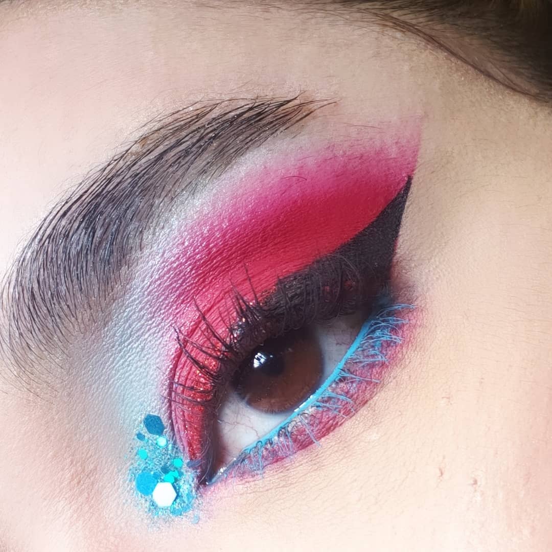 Womens Red Eyeshadow With Blue Tinge Makeup Look