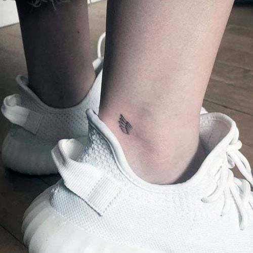 Womens Small Cute Feather Tattoo