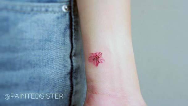 Womens Small Cute Pink Flower Tattoo On Wrists