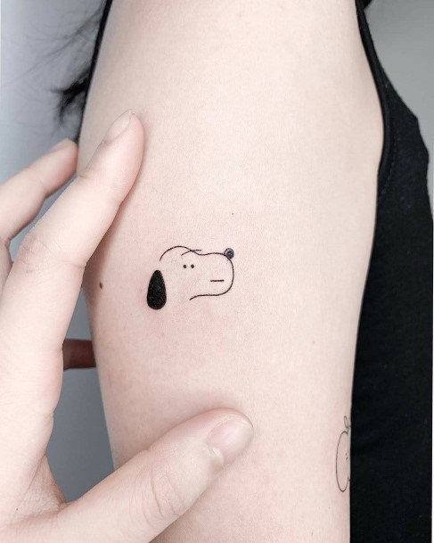 Womens Small Goofy Character Tattoo On Arms