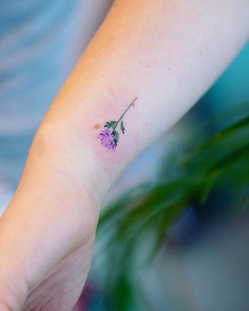 Womens Small Lavendar Blossom Tattoo On Back Wrist