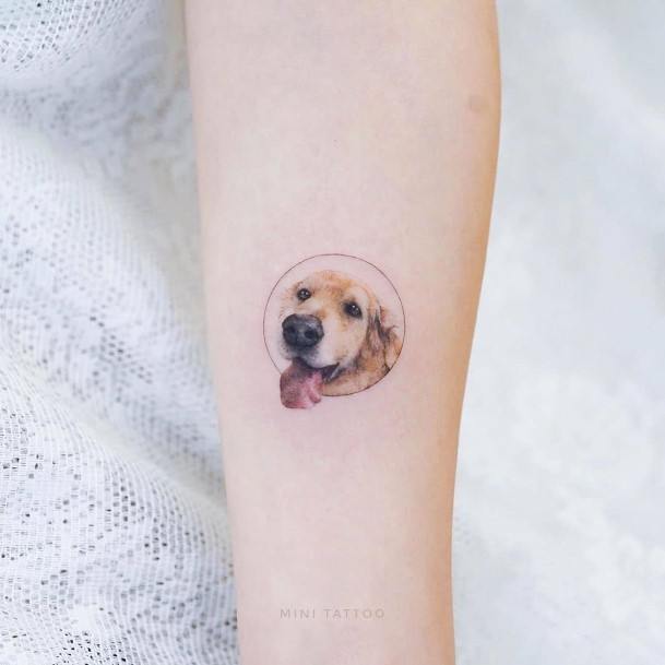 Womens Small Tongue Out Dog Tattoo On Arms