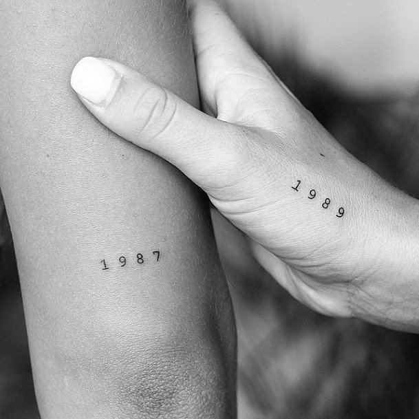 Womens Small Year Of Birth Tattoo On Arms