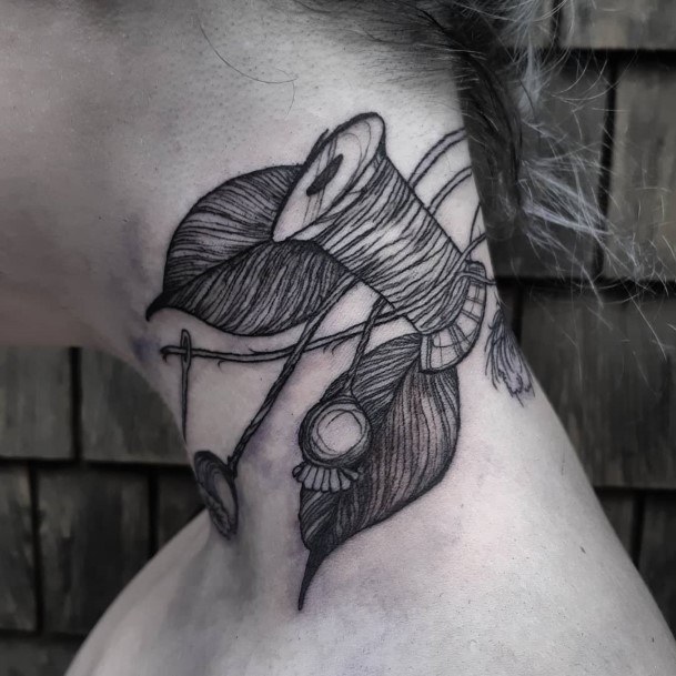 Womens Tattoo Art Needle And Thread Tattoo