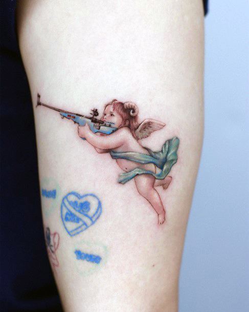 Womens Tattoo Ideas With Baby Angel Design