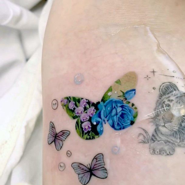 Womens Tattoo Ideas With Butterfly Flower Design