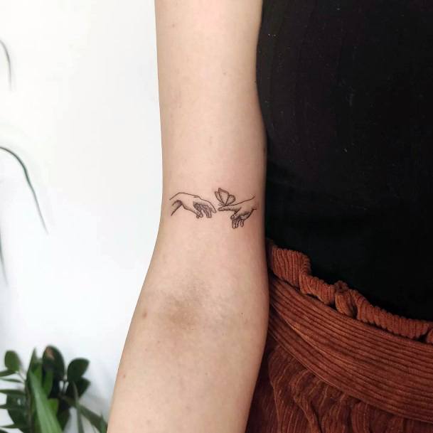 Womens Tattoo Ideas With Creation Of Adam Design