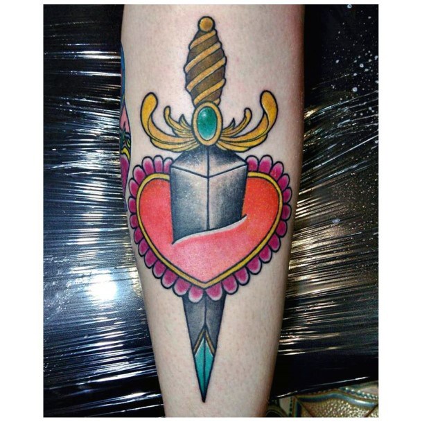 Womens Tattoo Ideas With Dagger Heart Design