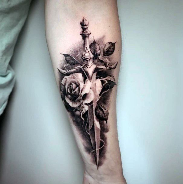 Womens Tattoo Ideas With Dagger Rose Design