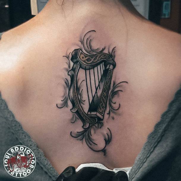 Womens Tattoo Ideas With Harp Design