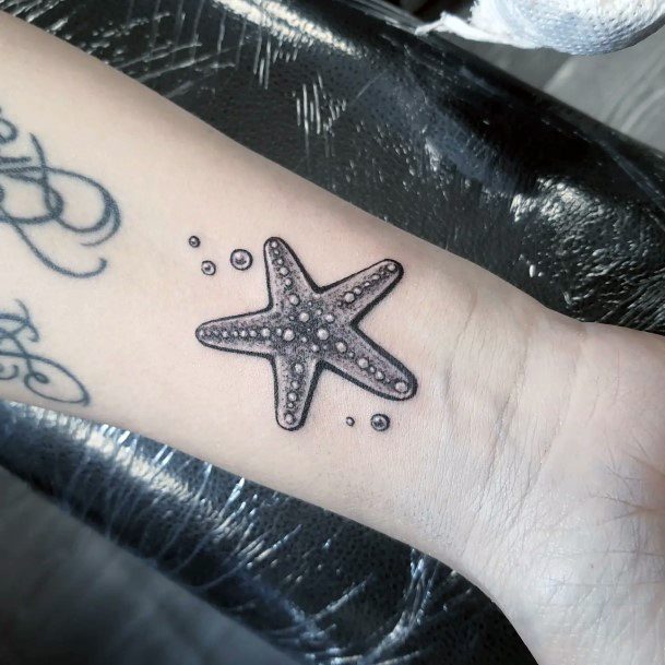 Womens Tattoo Ideas With Starfish Design