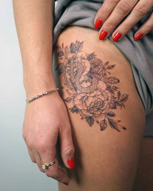 Womens Thighs Mangled Snake And Flower Tattoo Thighs