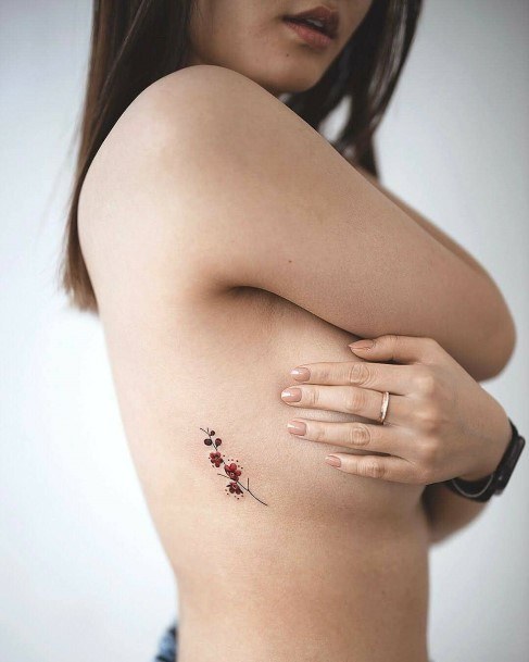 Womens Torso Small Flower Tattoo