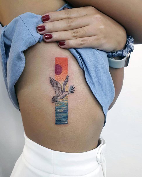 Womens Torso Sunset Beach Framed Dove Tattoo