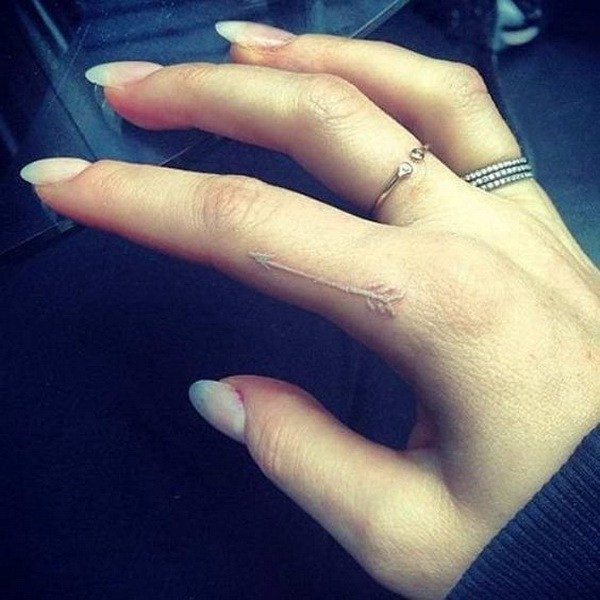 Womens White Arrow Tattoo On Fingers