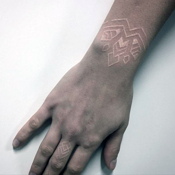 Womens Wrist White Ink Angle Tattoo