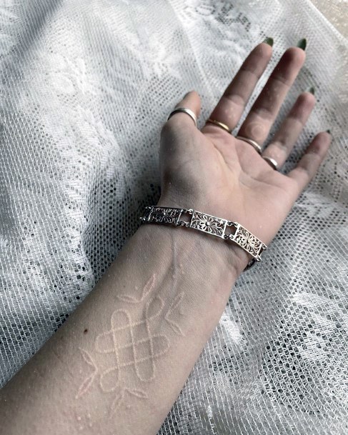Womens Wrists Kolam Art White Ink Tattoo
