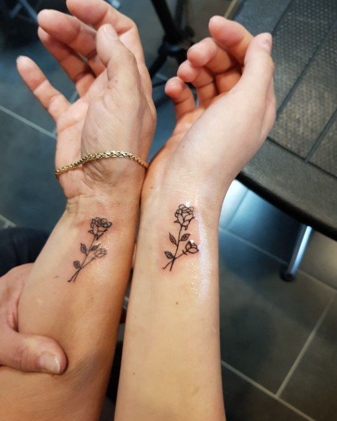 Womens Wrists Matching Roses Pair Tattoo