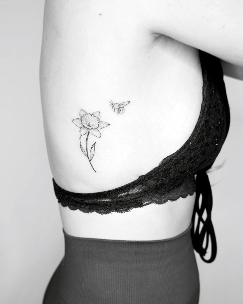 Womes Torso Flower And Bee Tattoo