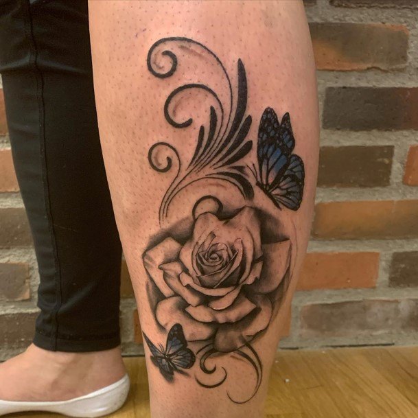 Wonderful Rose And Butterfly Tattoo Womens Legs