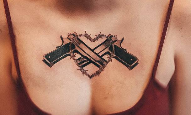 Wondrous Ladies Gun Tattoos