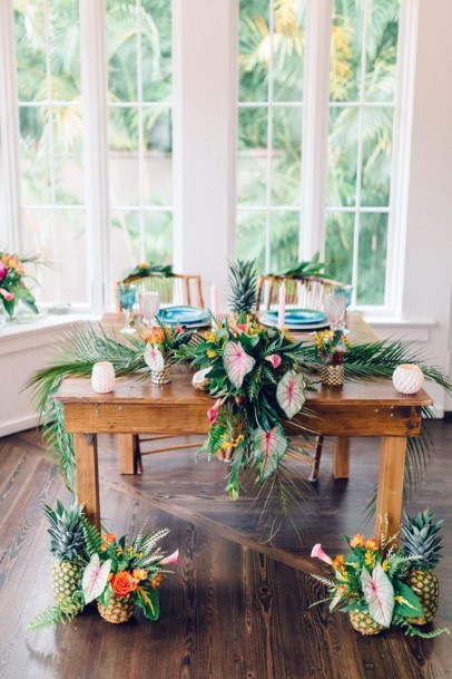 Wooden Dining Wedding Table With Tropical Flowers