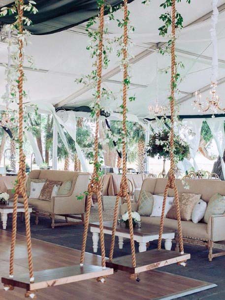 Wooden Swings On Tents Wedding Celebration