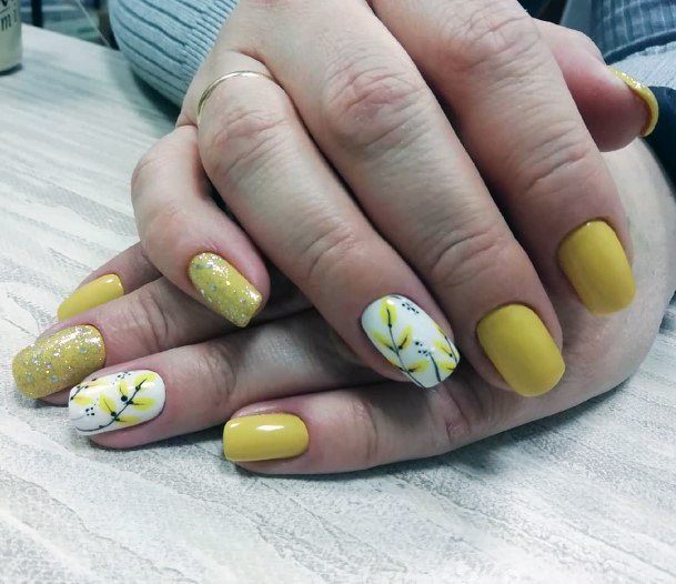 Yellow Japanese Blossoms On White Nails