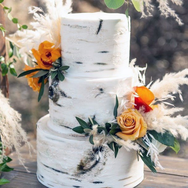 Yellow Roses On Rustic Wedding Cake