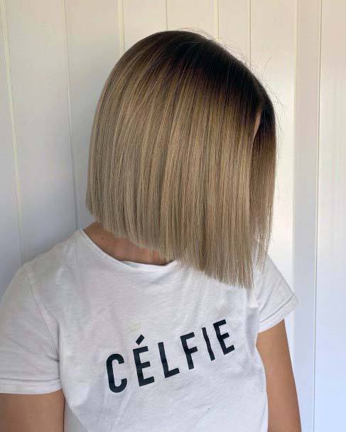 Young Woman With Lovely Blunt Modified Mid Length Bob Haircut