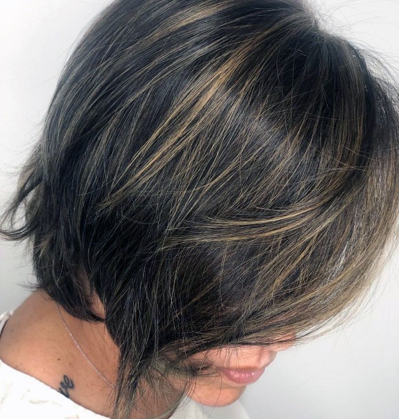 Youthful Hairstyles Over 50 Brown Side Swept Bangs