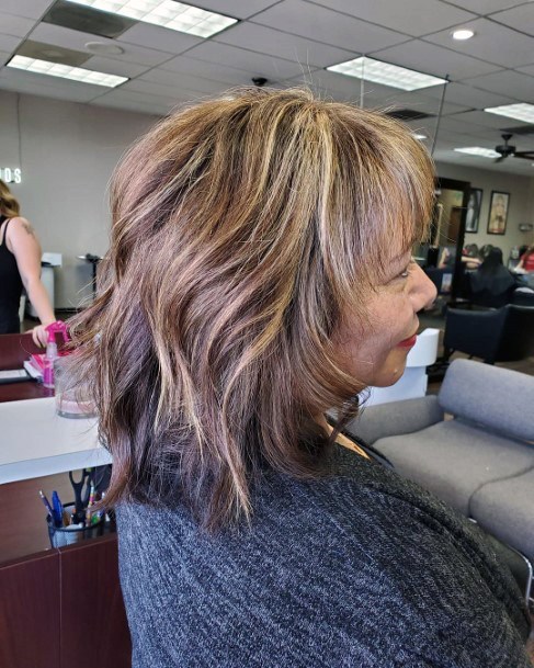 Youthful Hairstyles Over 50 Wavy Bob With Bangs