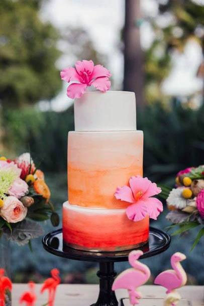 Zesty Orange Themed Cake And Beach Wedding Flowers